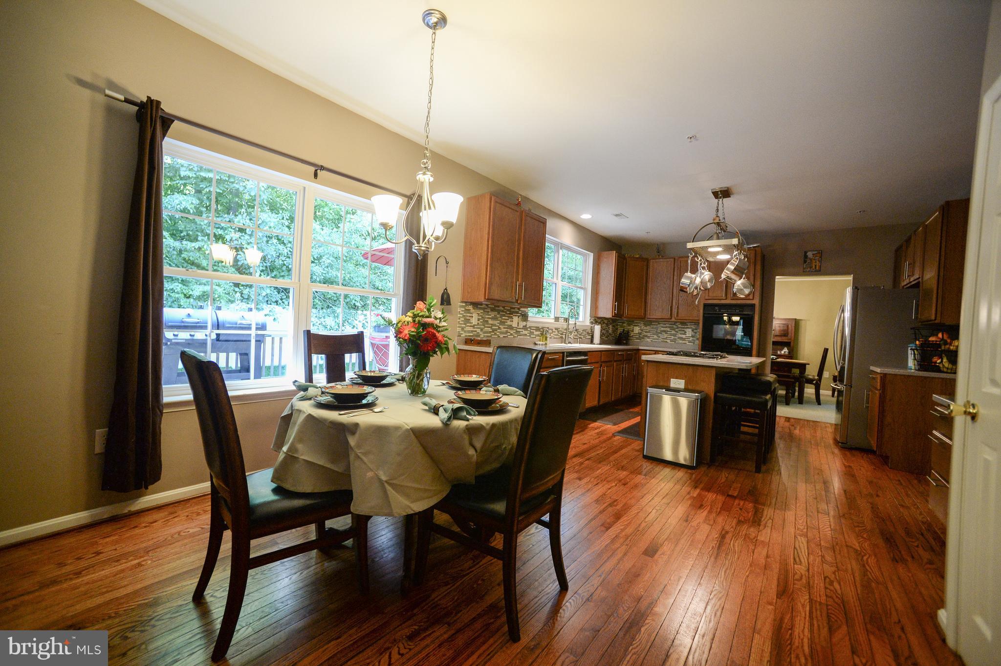 12017 Cross Rd Trail Brandywine, MD 20613 - Photo 4 of 30 Eat-in kitchen and breakfast bar for relaxed meals