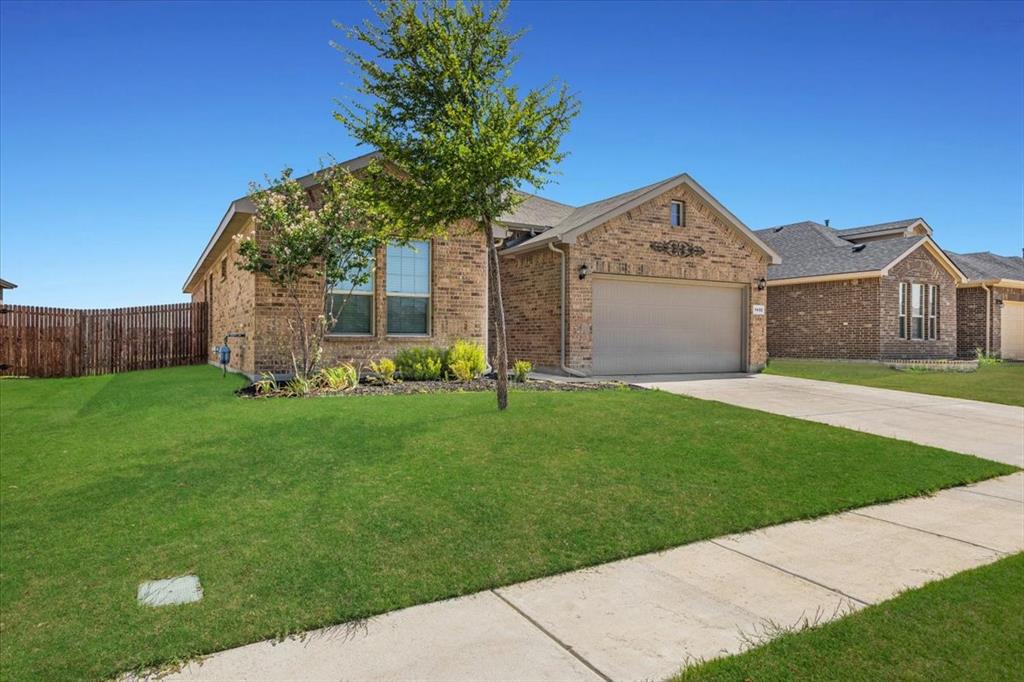 1402 Pleasanton Road Cleburne, TX 76033 - Photo 4 of 36 Brick exterior with an attached garage