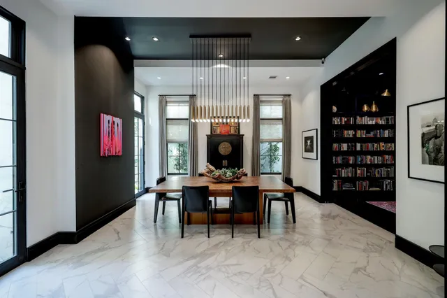 a view of a livingroom with furniture and entryway
