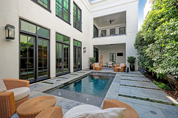 a front view of house with outdoor seating