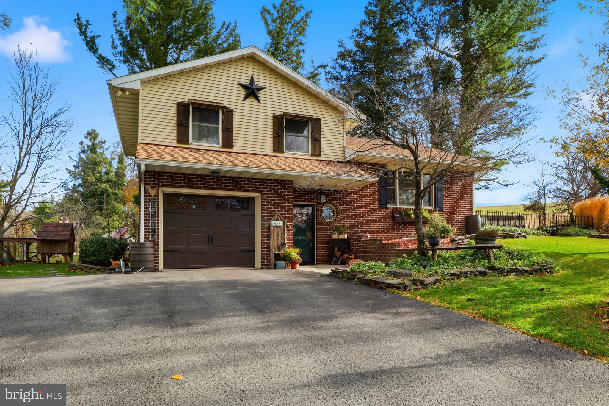 1934 Forge Heights Ln Spring Grove Spring Grove, PA 17362 - Photo 1 of 53 a front view of a house with a yard