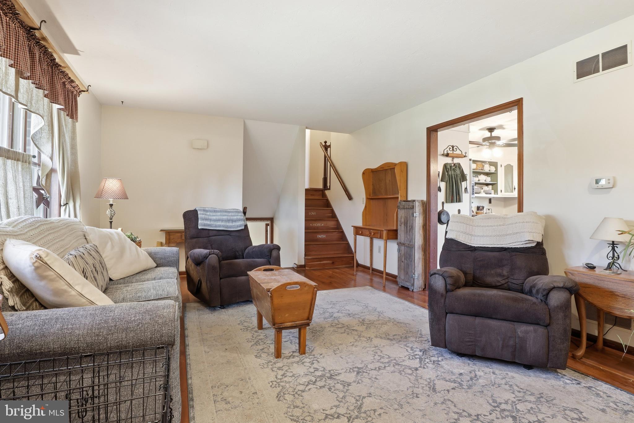 1934 Forge Heights Ln Spring Grove Spring Grove, PA 17362 - Photo 12 of 53 a living room with furniture a lamp and a potted plant