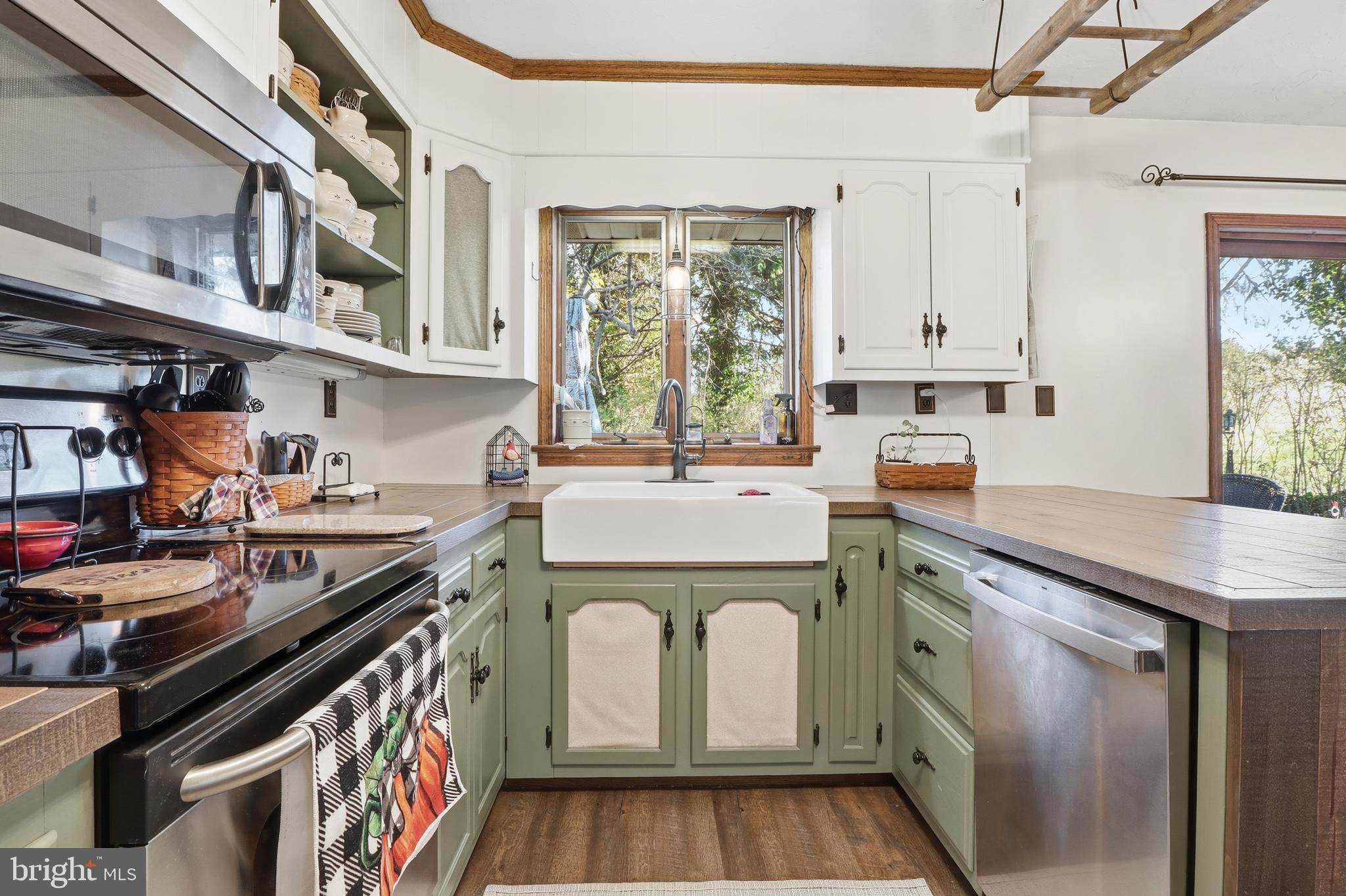 1934 Forge Heights Ln Spring Grove Spring Grove, PA 17362 - Photo 19 of 53 a kitchen with a sink appliances cabinets and a window