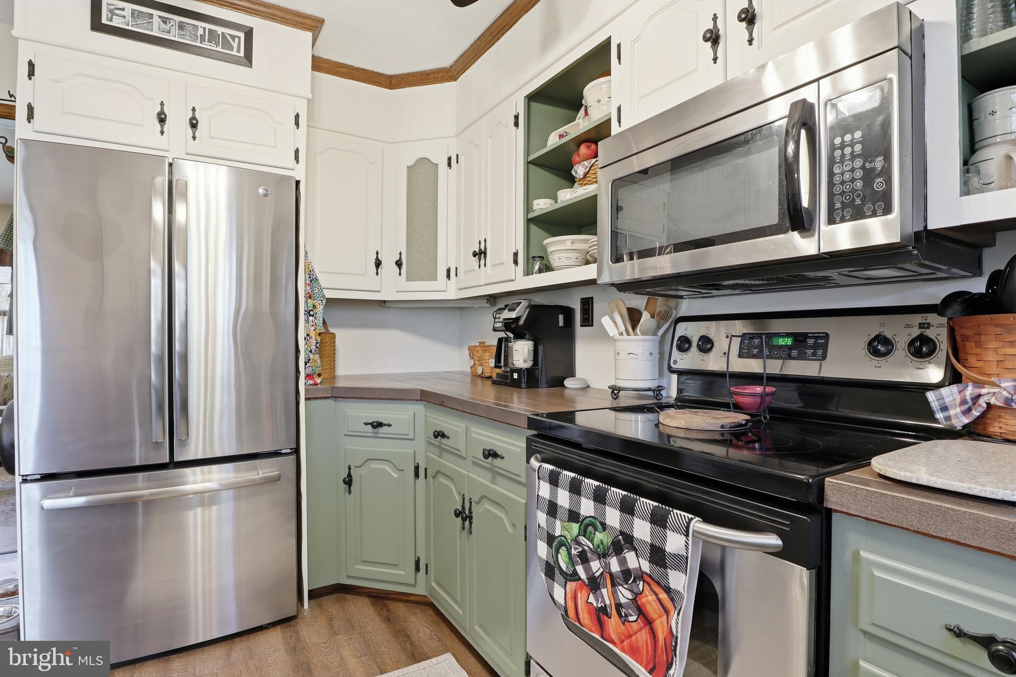 1934 Forge Heights Ln Spring Grove Spring Grove, PA 17362 - Photo 20 of 53 a kitchen with stainless steel appliances granite countertop a refrigerator and a stove top oven