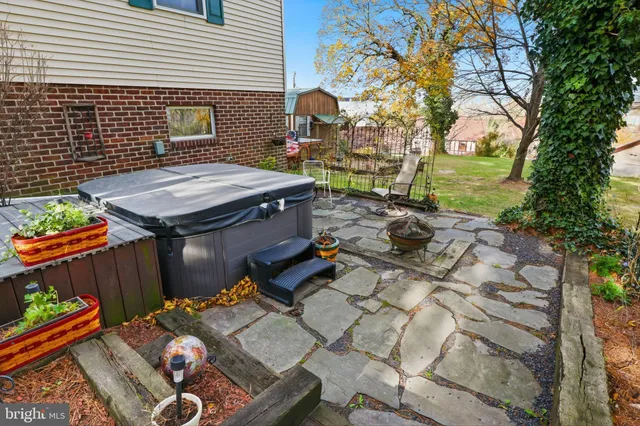 a backyard of a house with seating space