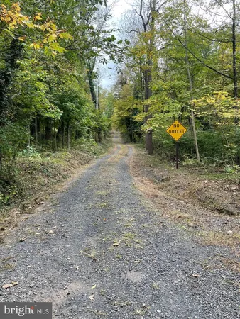 a sign on the side of a road