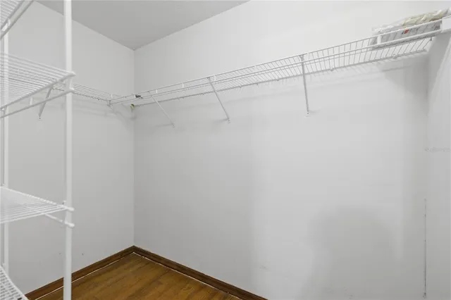 a view of a room with racks on the wall