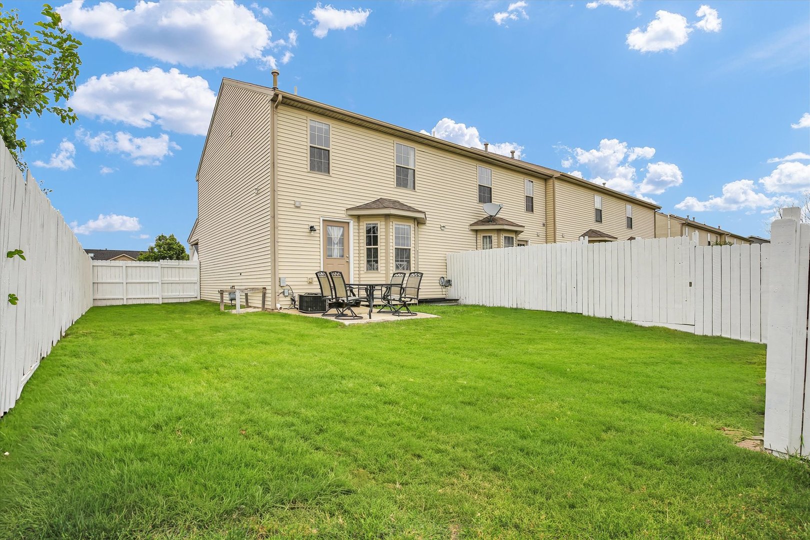 3715 Boulder Ridge Drive Champaign, IL 61822 - Photo 28 of 29 a front view of a house with garden
