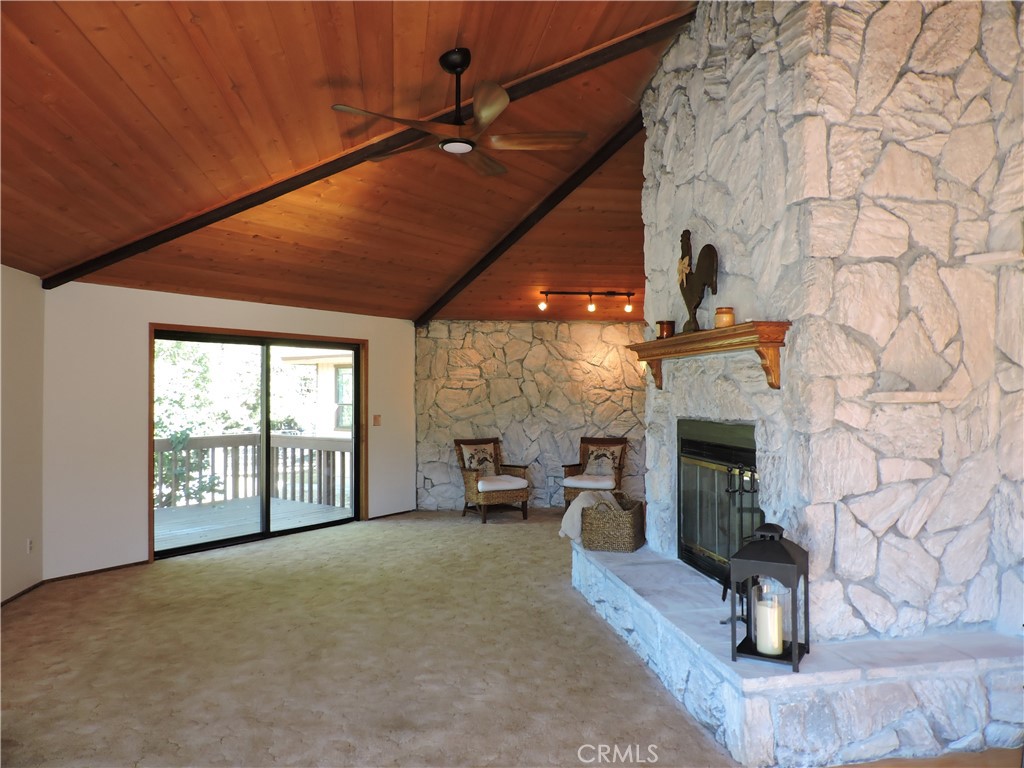 26931 Columbia Way Tehachapi, CA 93561 - Photo 28 of 49 Two sets of Large Sliding Glass Doors provide wonderful light and access to the deck and back yard.