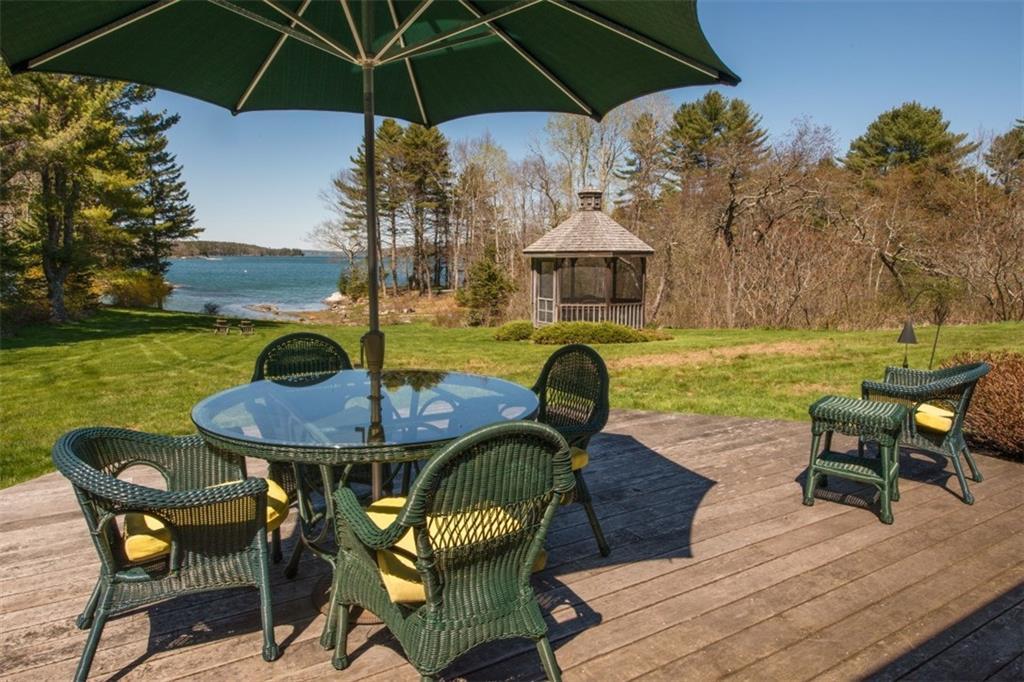 49 Meadow Cove Road Boothbay, ME 04544 - Photo 8 of 35 The back deck with views of the...