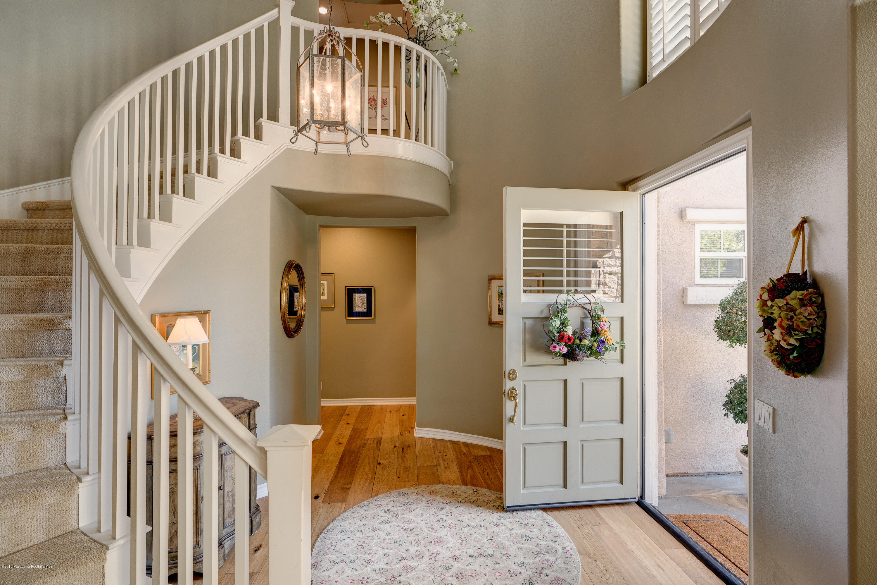 3520 Giddings Ranch Road Altadena, CA 91001 - Photo 4 of 41 a view of staircase with white walls and windows