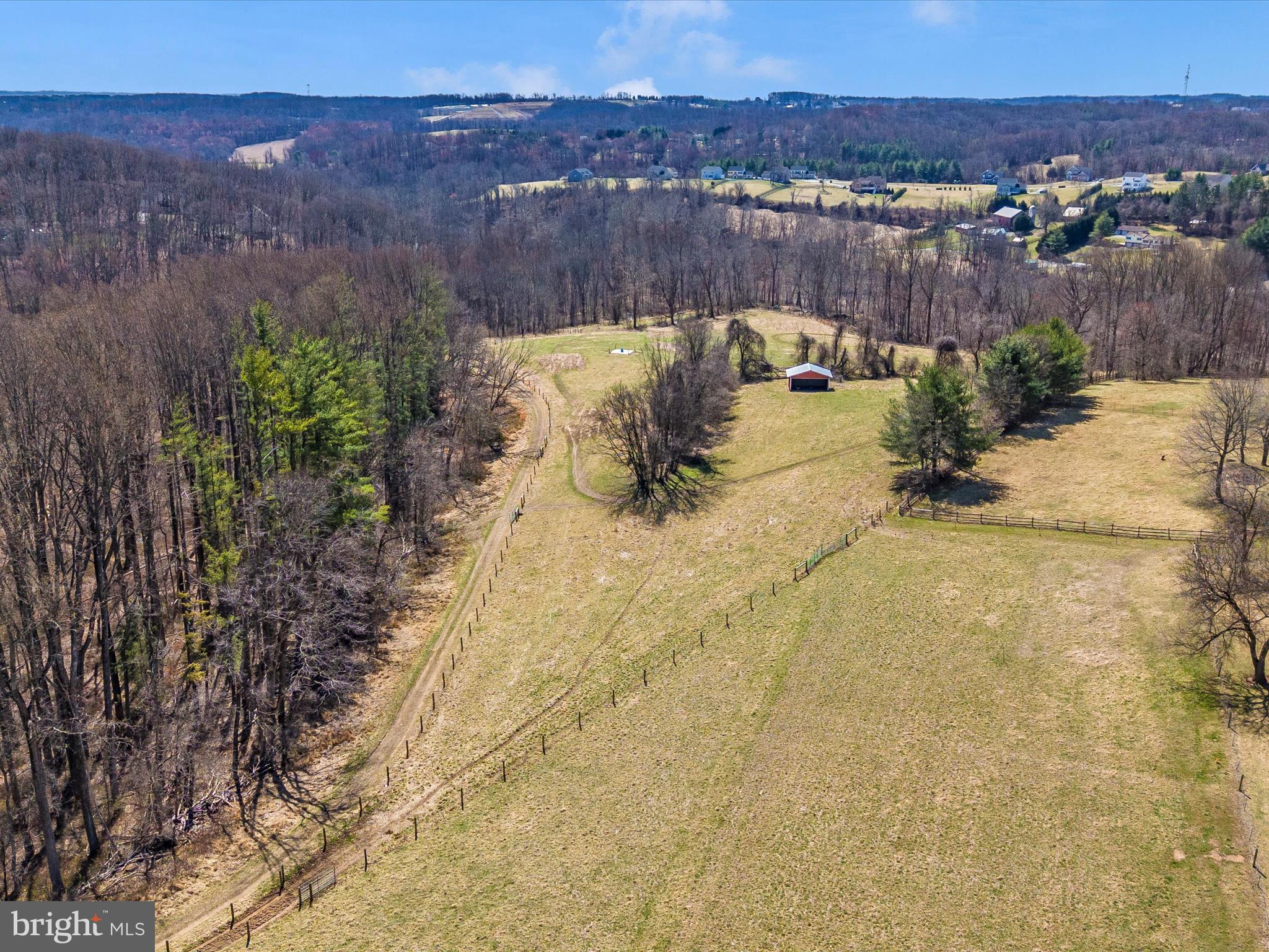 1345 Brehm Road Westminster, MD 21157 - Photo 116 of 131 an aerial view of a house with a yard and lake view