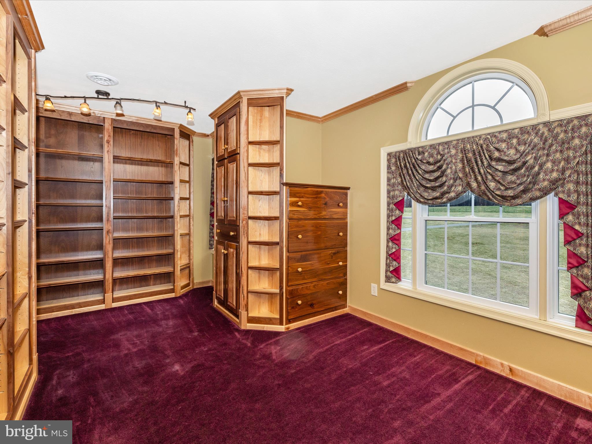1345 Brehm Road Westminster, MD 21157 - Photo 48 of 131 a view of an empty room with a window and wooden floor