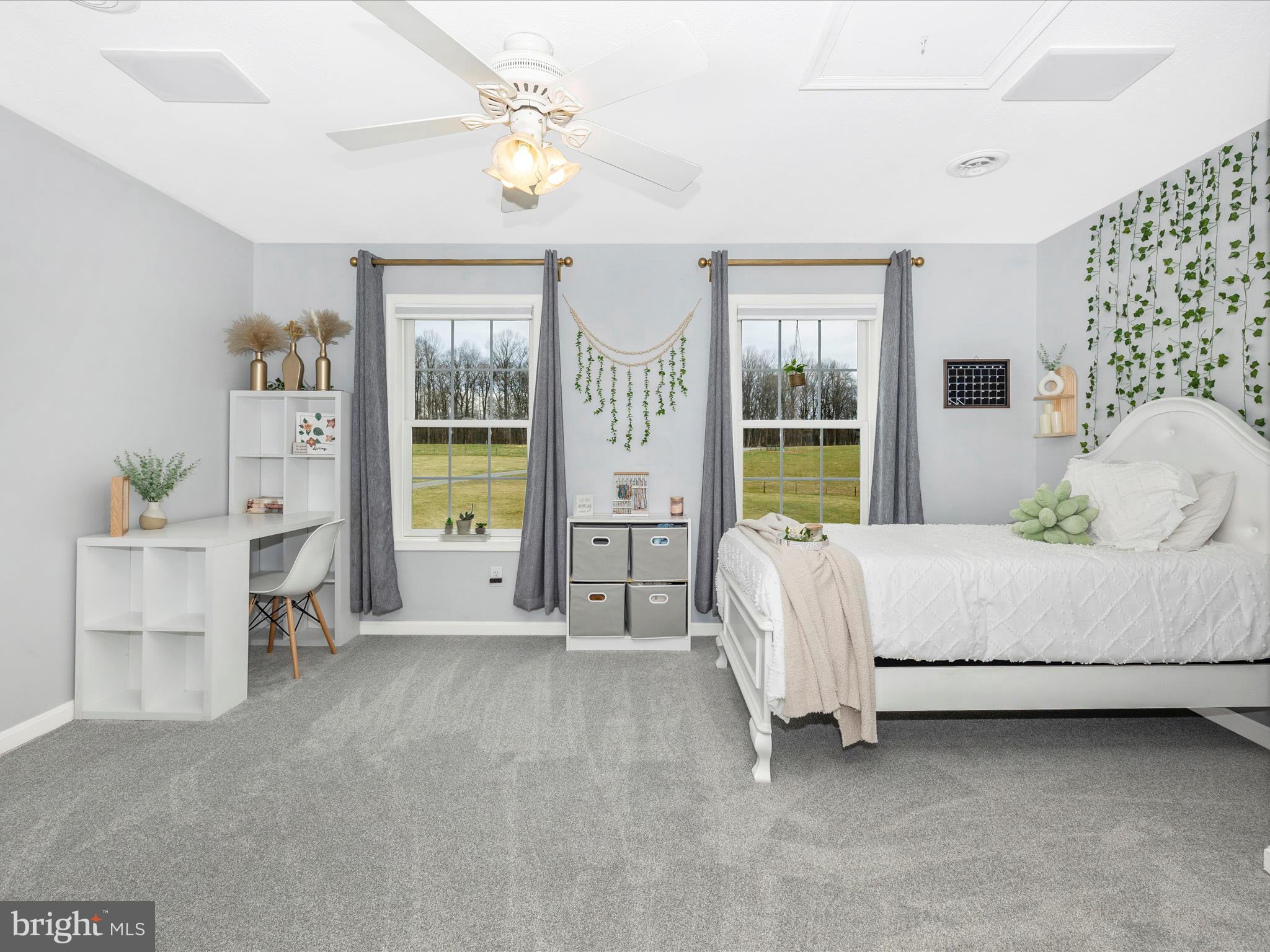 1345 Brehm Road Westminster, MD 21157 - Photo 58 of 131 a bed room with a bed and a chandelier