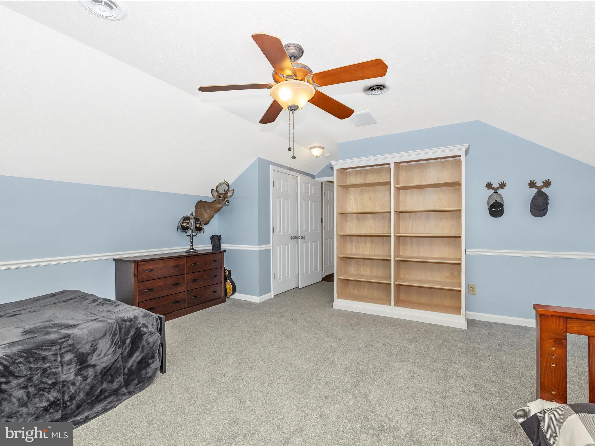 1345 Brehm Road Westminster, MD 21157 - Photo 64 of 131 a bedroom with a bed and a ceiling fan