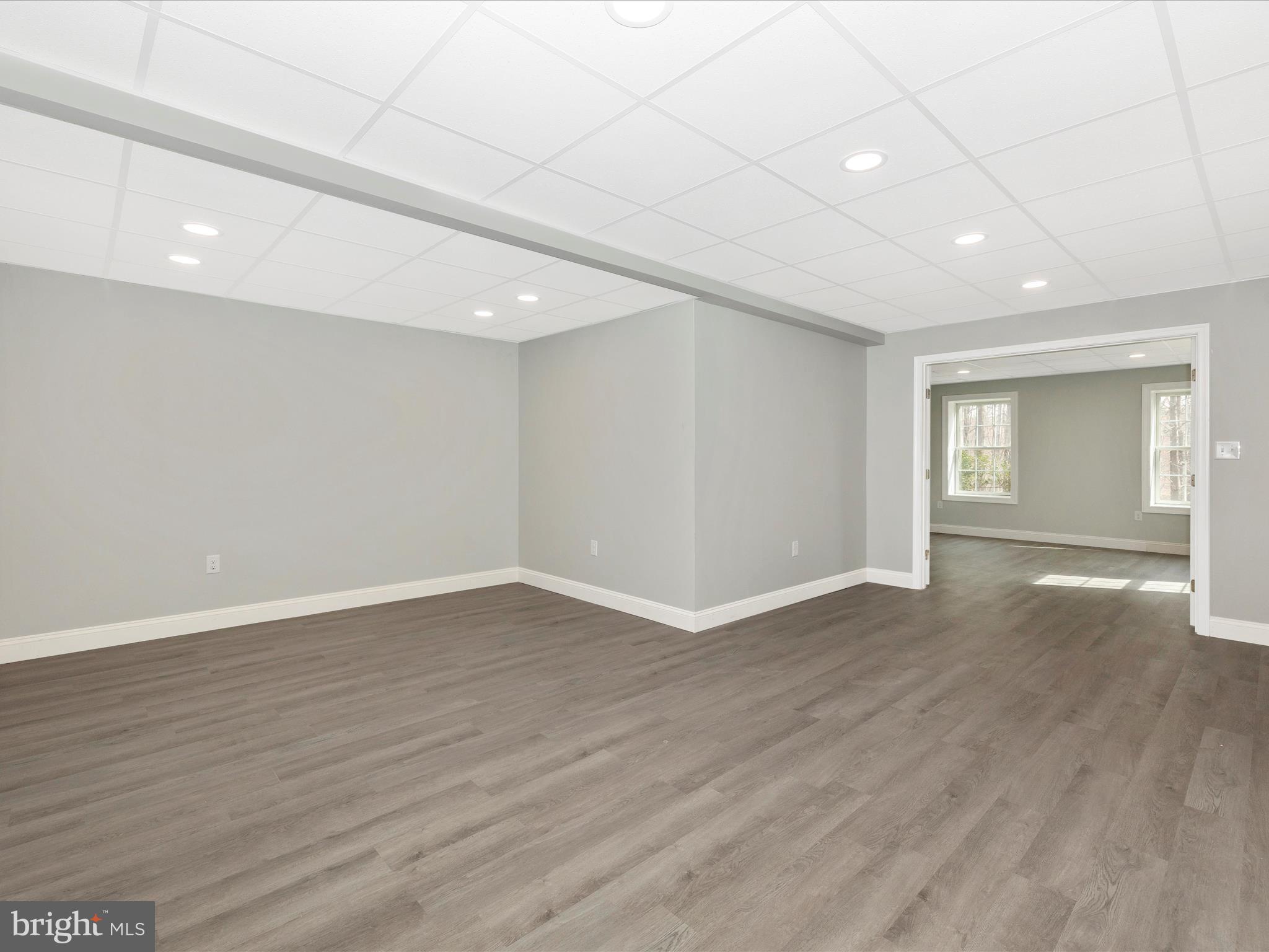 1345 Brehm Road Westminster, MD 21157 - Photo 74 of 131 a view of an empty room with wooden floor and window
