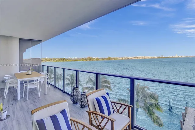 a view of roof deck with furniture