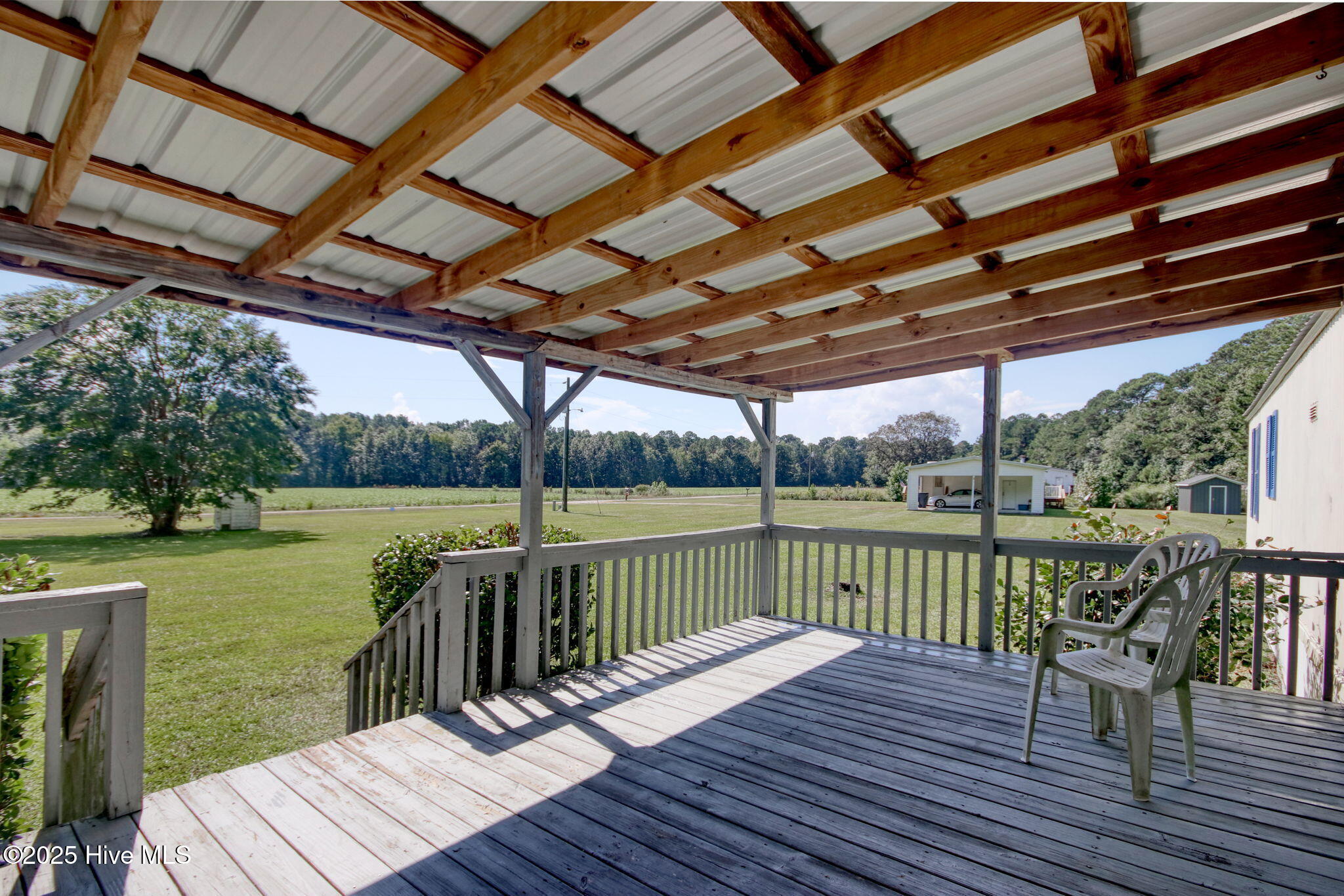 6952 Reed Trail Northwest Ocean Isle Beach, NC 28469 - Photo 15 of 25 Nice view from the covered front porch!