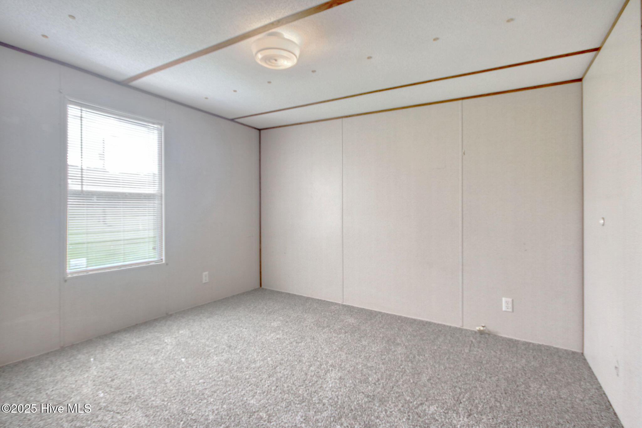 6952 Reed Trail Northwest Ocean Isle Beach, NC 28469 - Photo 7 of 25 New Carpet in Master Bedroom