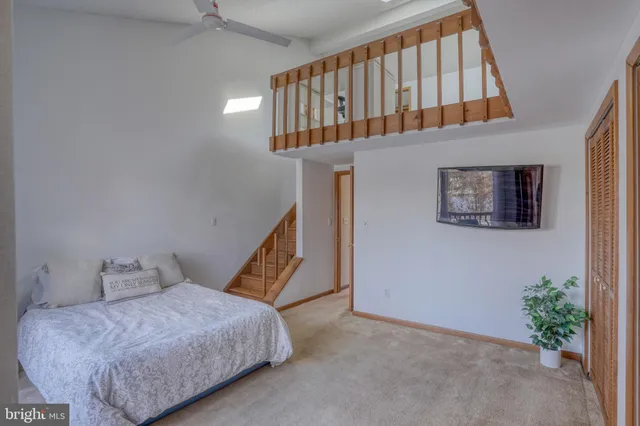 a balcony with wooden fence