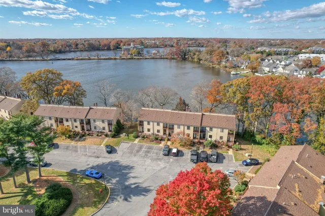 an aerial view of a house with outdoor space