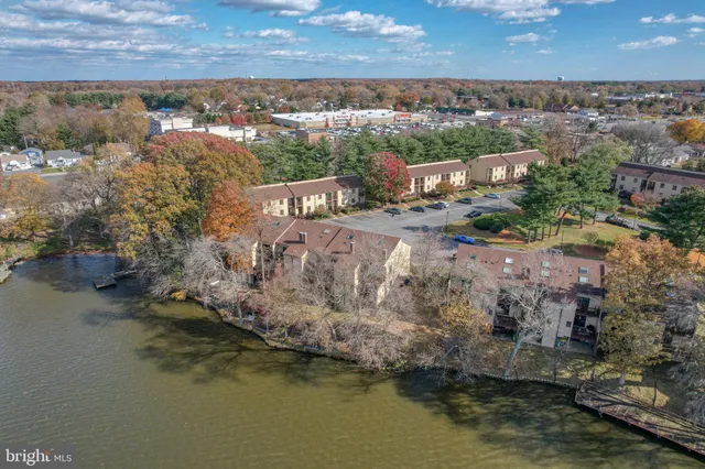 an aerial view of a city with ocean view
