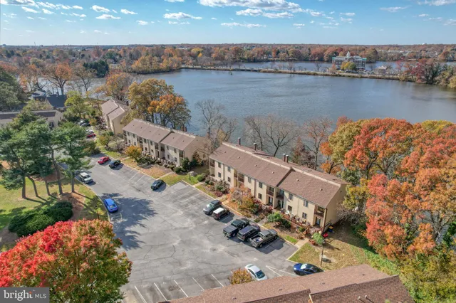 a view of an entryway door with wooden floor