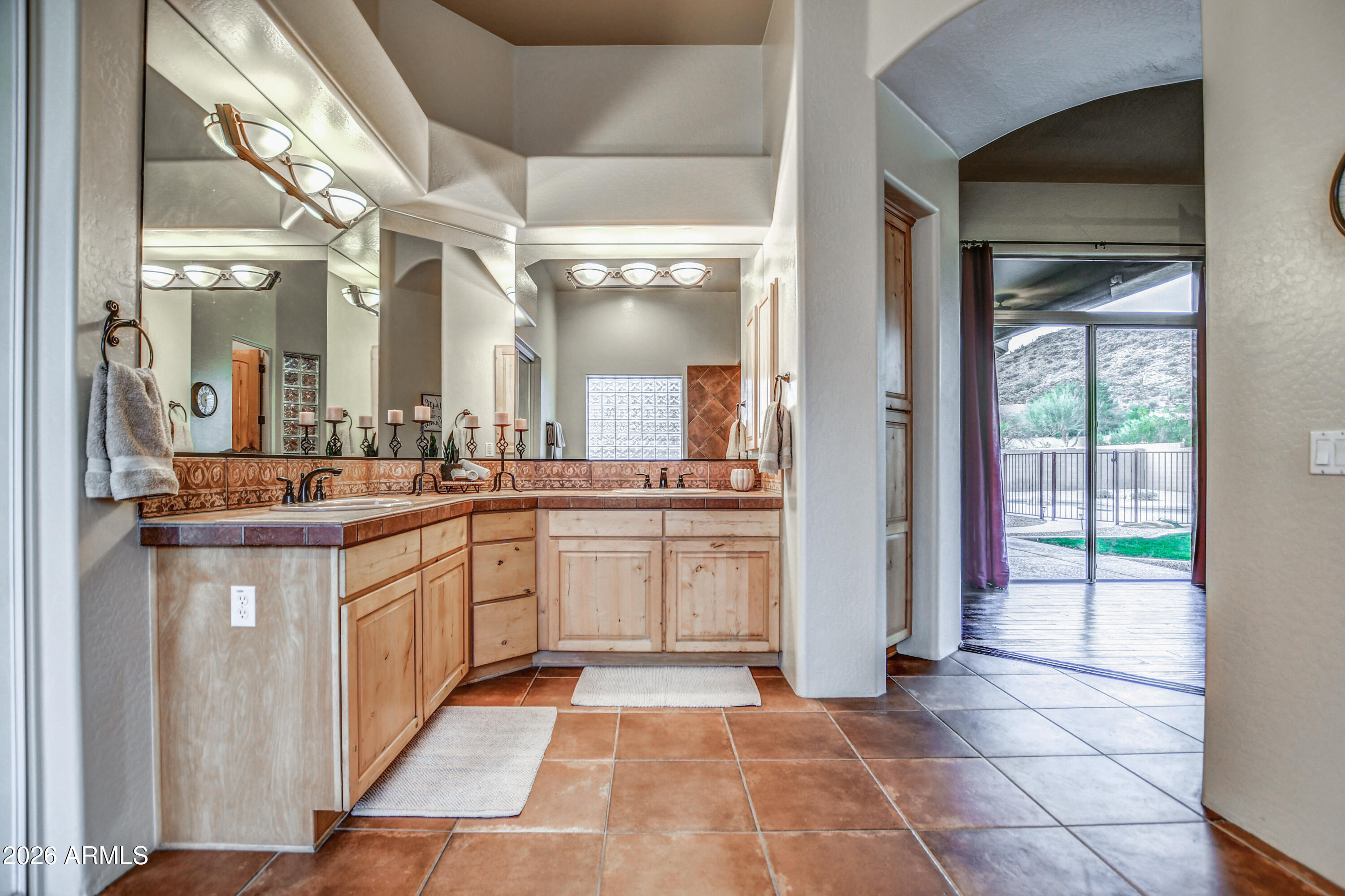 25801 North Lawler Loop Phoenix, AZ 85083 - Photo 30 of 43 a large white kitchen with a large window and cabinets