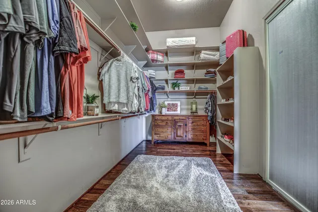 a building outdoor space with patio furniture and garden