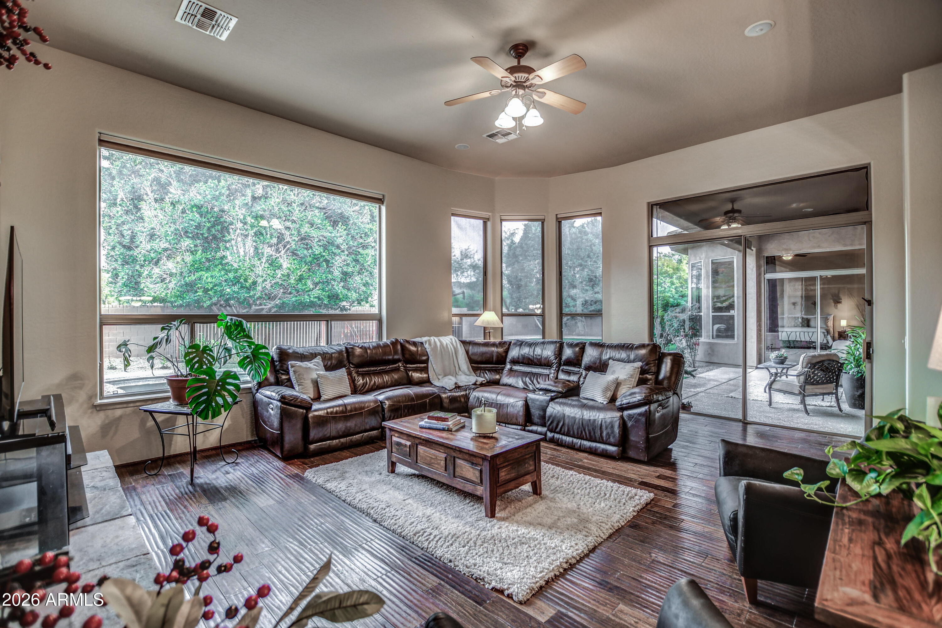25801 North Lawler Loop Phoenix, AZ 85083 - Photo 8 of 43 a living room with furniture and a large window