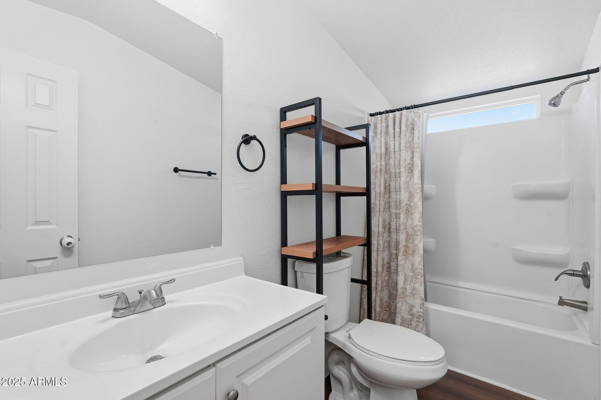 320 East McKellips Road, Unit 166 Mesa, AZ 85201 - Photo 17 of 24 a bathroom with a sink toilet and shower