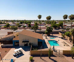 320 East McKellips Road, Unit 166 Mesa, AZ 85201 - Photo 22 of 24 a view of a terrace with lawn chairs