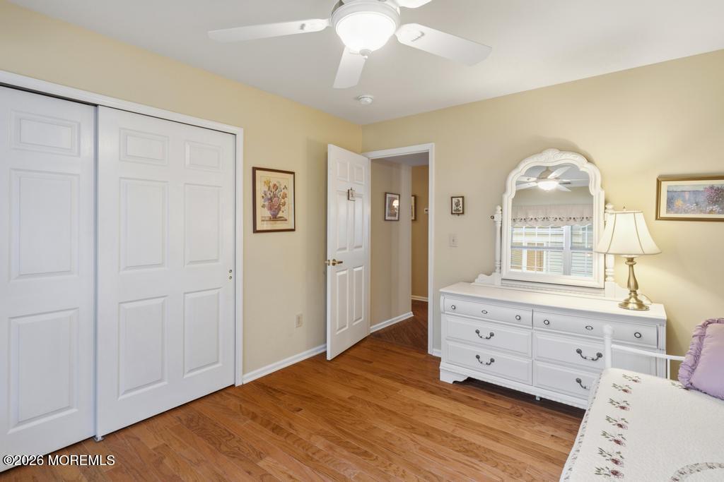 2287 Coral Leaf Road Toms River, NJ 08755 - Photo 29 of 38 a room with painting on the wall and a dresser