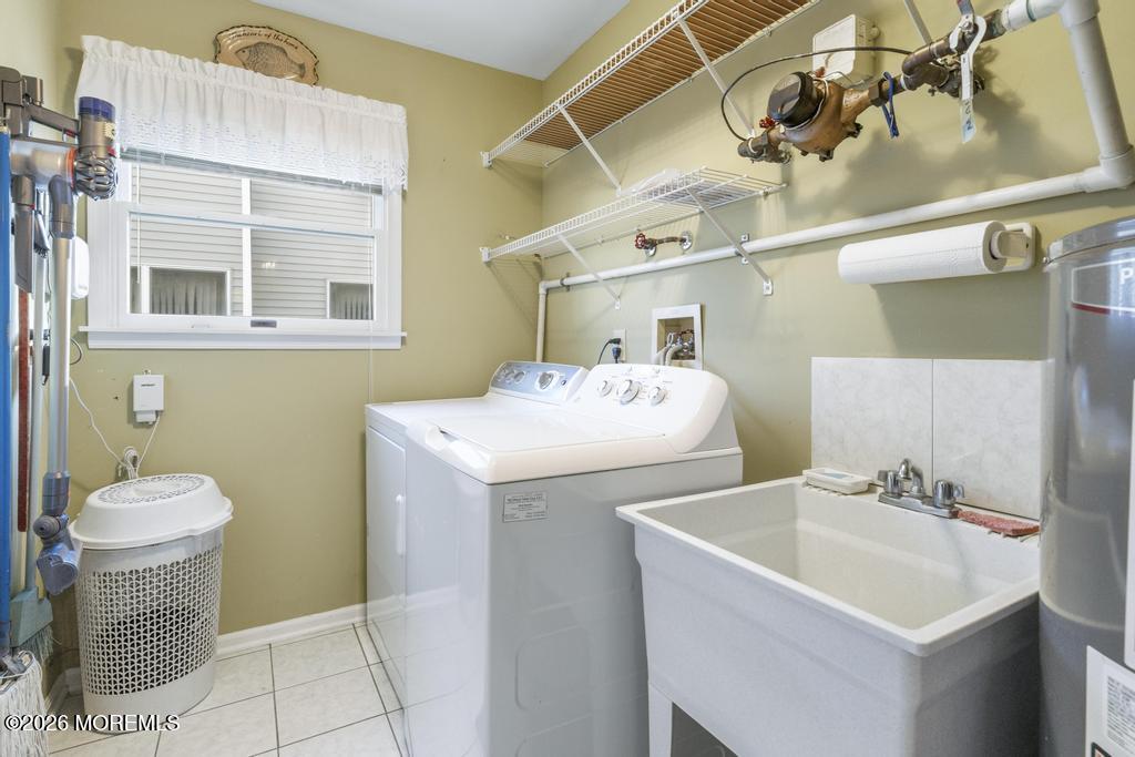 2287 Coral Leaf Road Toms River, NJ 08755 - Photo 30 of 38 a bathroom with a sink toilet and a mirror