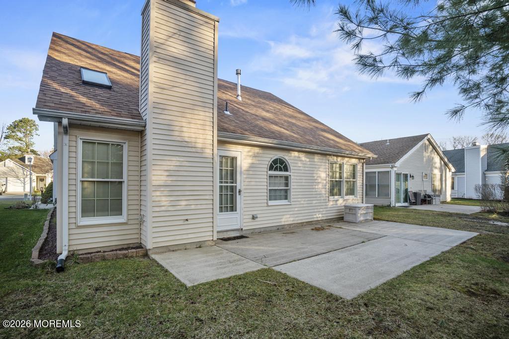 2287 Coral Leaf Road Toms River, NJ 08755 - Photo 38 of 38 a front view of a house with a yard and garage