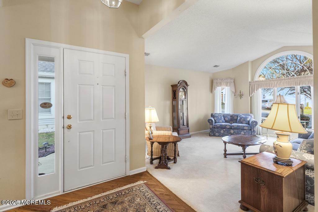 2287 Coral Leaf Road Toms River, NJ 08755 - Photo 4 of 38 a living room with furniture and a table