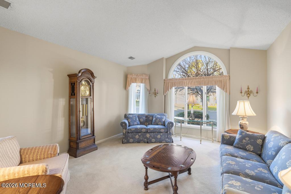 2287 Coral Leaf Road Toms River, NJ 08755 - Photo 5 of 38 a living room with furniture and a large window