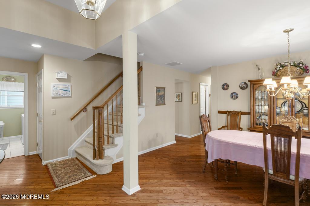 2287 Coral Leaf Road Toms River, NJ 08755 - Photo 9 of 38 a living room with furniture and wooden floor