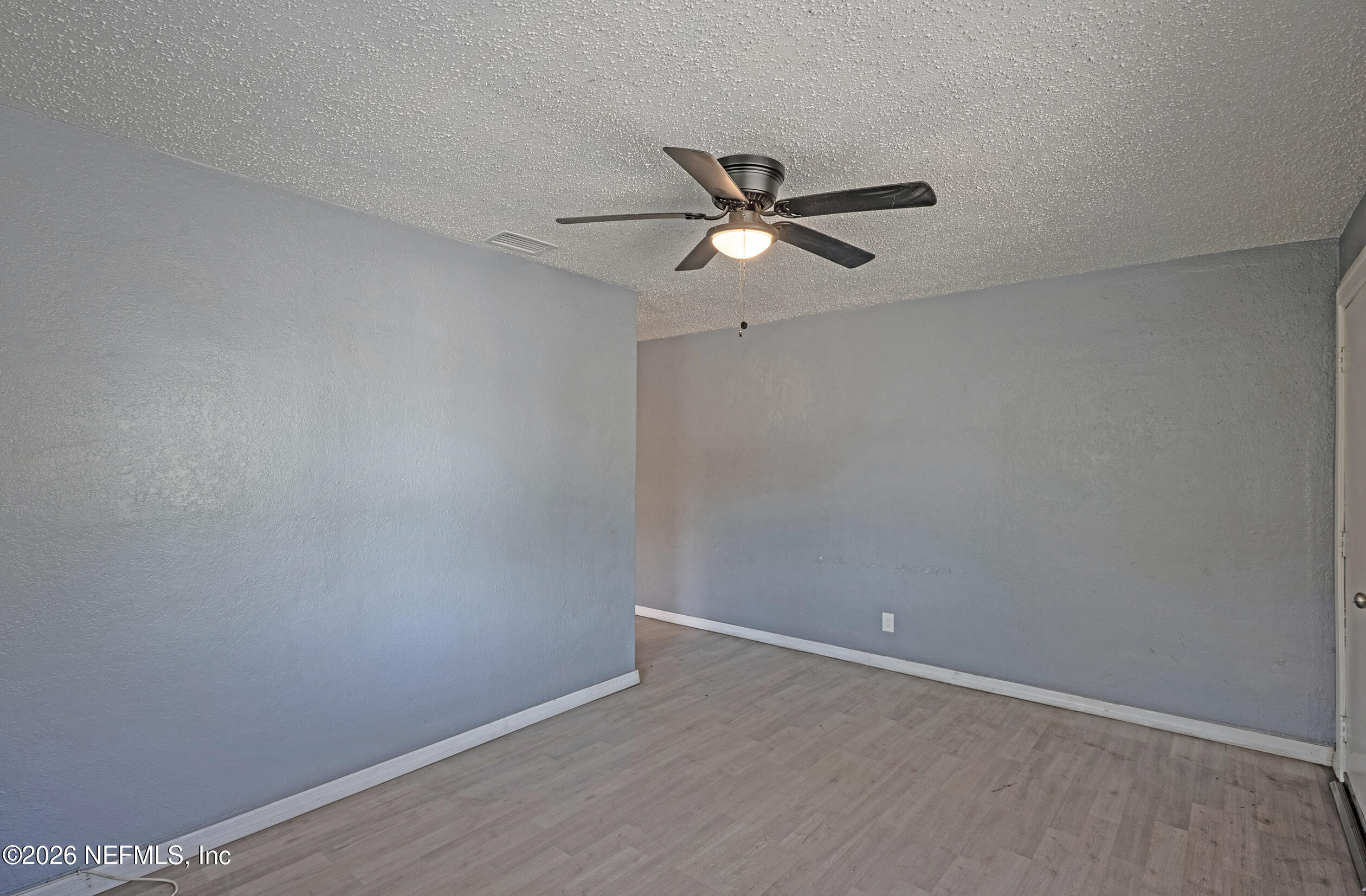 4114 Moncrief Road Jacksonville, FL 32209 - Photo 8 of 42 a view of a big room with carpet