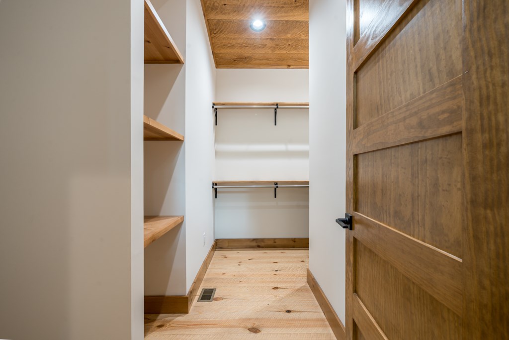 221 Goldmine Road Morganton, GA 30560 - Photo 27 of 51 a view of walk in closet with empty room