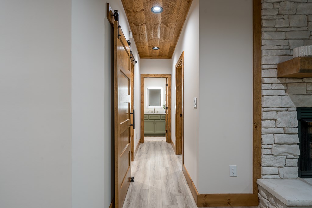 221 Goldmine Road Morganton, GA 30560 - Photo 38 of 51 a view of a hallway with wooden floor and staircase