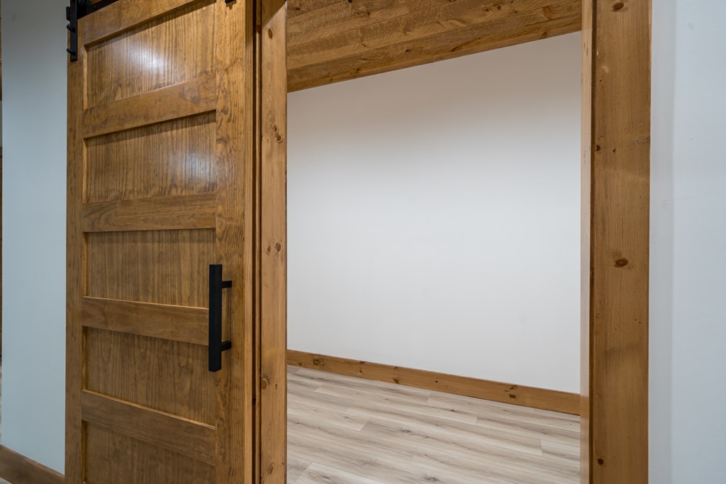 221 Goldmine Road Morganton, GA 30560 - Photo 39 of 51 a bathroom with a glass door shower and a mirror