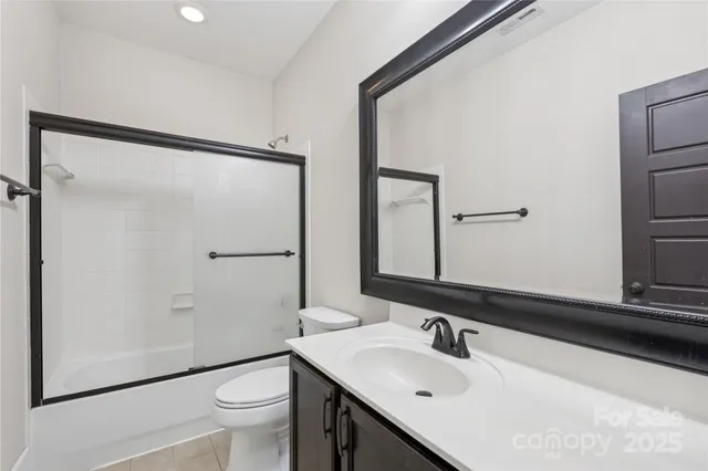 a view of a street from a balcony