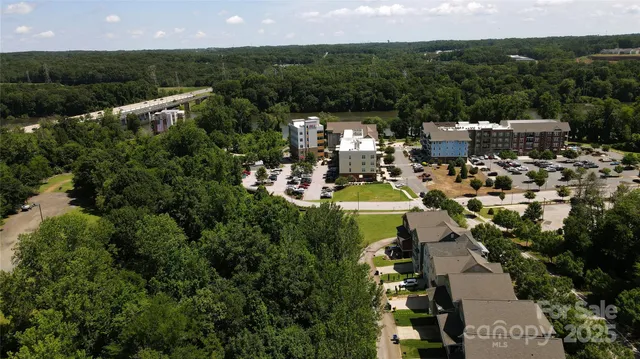 an aerial view of house with yard
