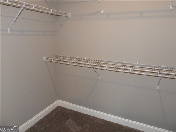 5915 Rye Patch Road Ludowici, GA 31316 - Photo 23 of 25 a view of a room with racks on the wall