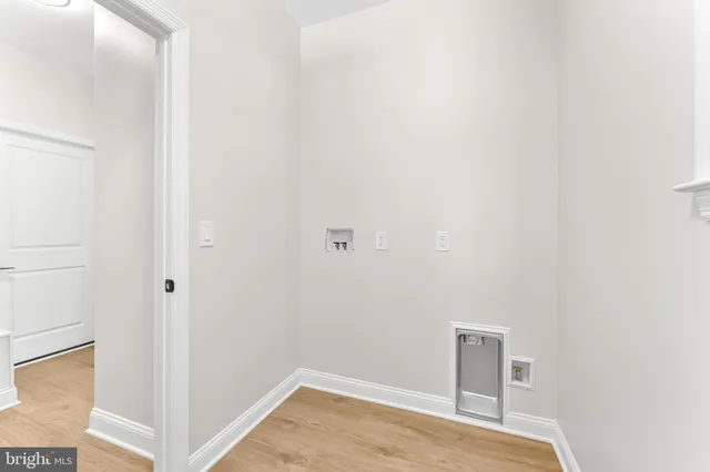 a view of small space with wooden floor