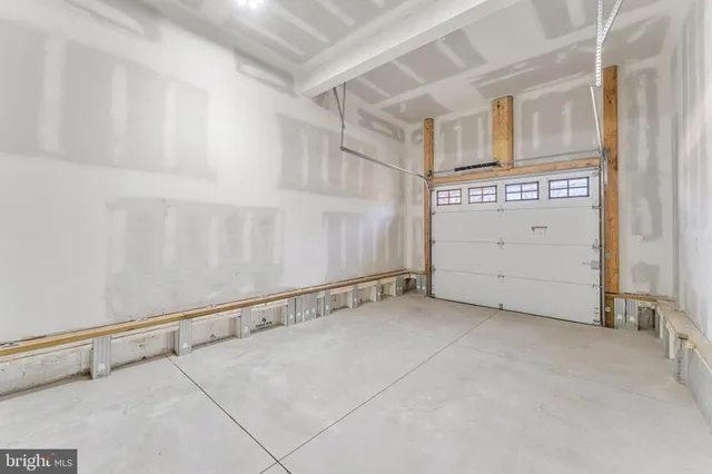 a view of a utility room with closet