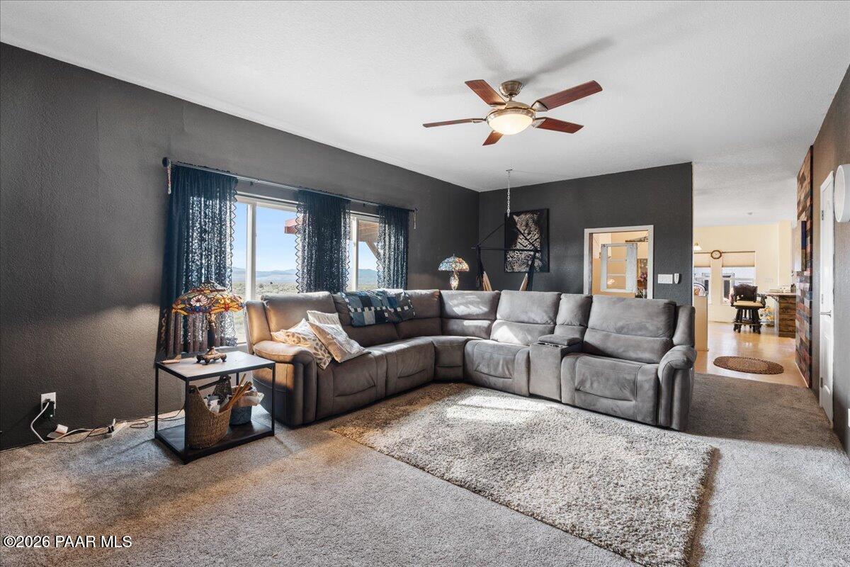 8475 West Red Rock Road Kirkland, AZ 86332 - Photo 14 of 39 a living room with furniture
