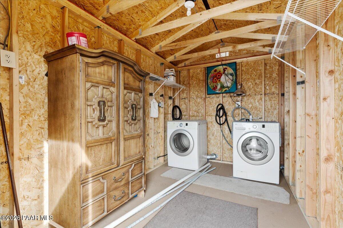 8475 West Red Rock Road Kirkland, AZ 86332 - Photo 35 of 39 a view of a storage & utility room with washer and dryer