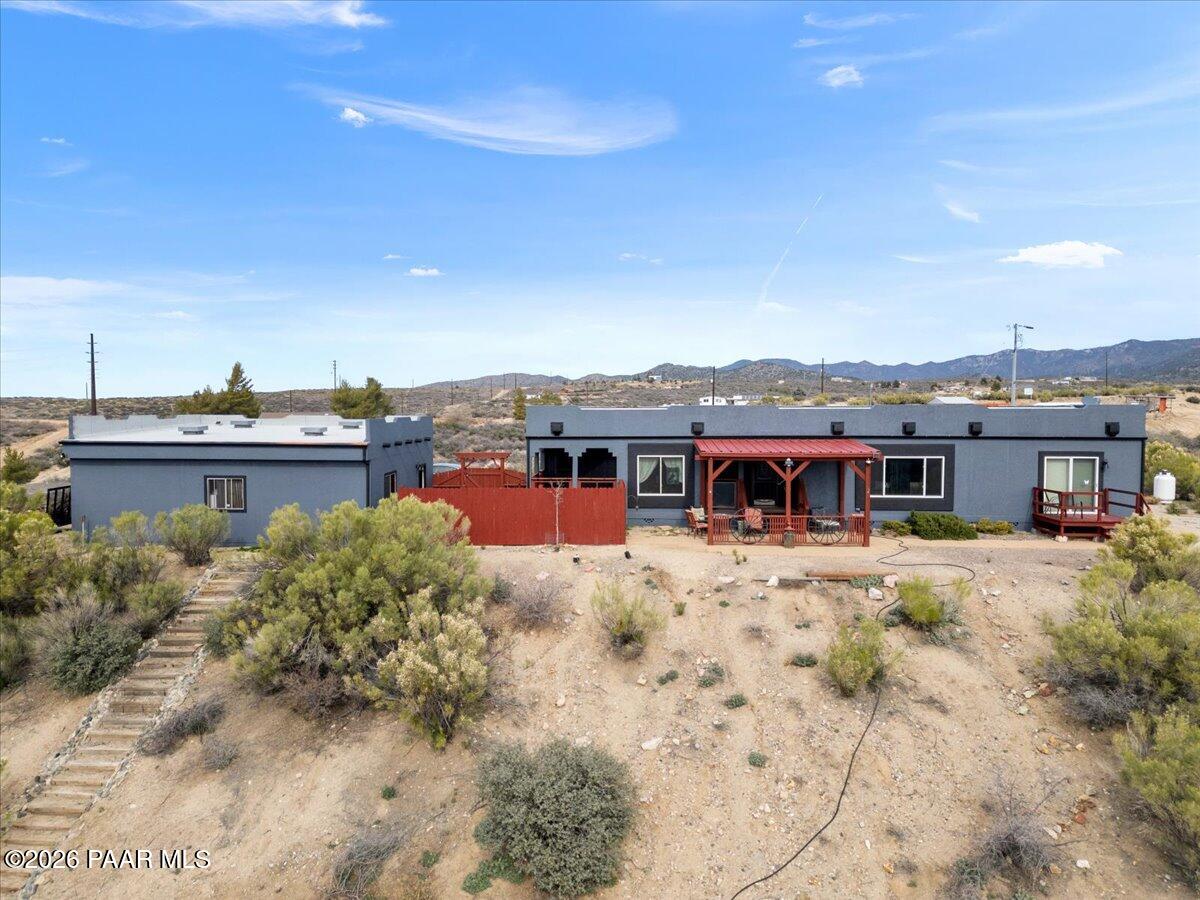 8475 West Red Rock Road Kirkland, AZ 86332 - Photo 36 of 39 a view of a house with a yard